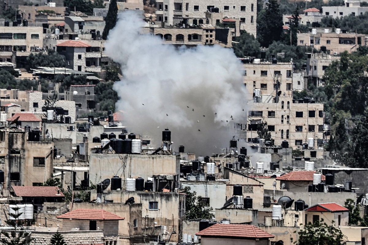 Jenin has long been a stronghold for Palestinian militant groups, and the Israeli army routinely carries out raids in the city and adjacent camp. (AFP)