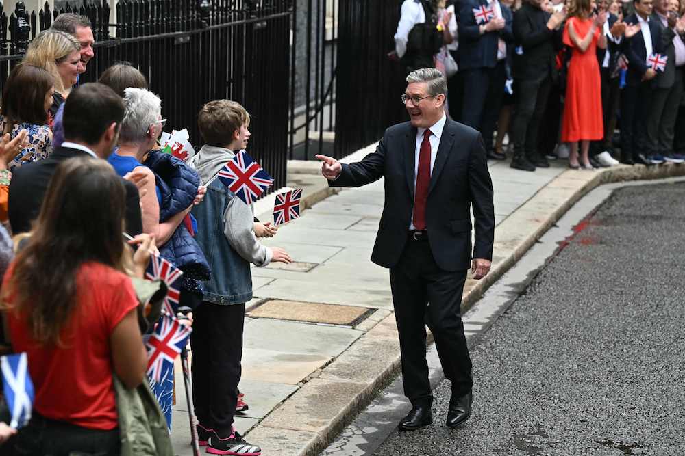 Britain's incoming Prime Minister and leader of the Labour Party, Keir Starmer, thanks supporters and members of the party after he following his general election victory, in Downing Street in London on July 5, 2024. (AFP)
