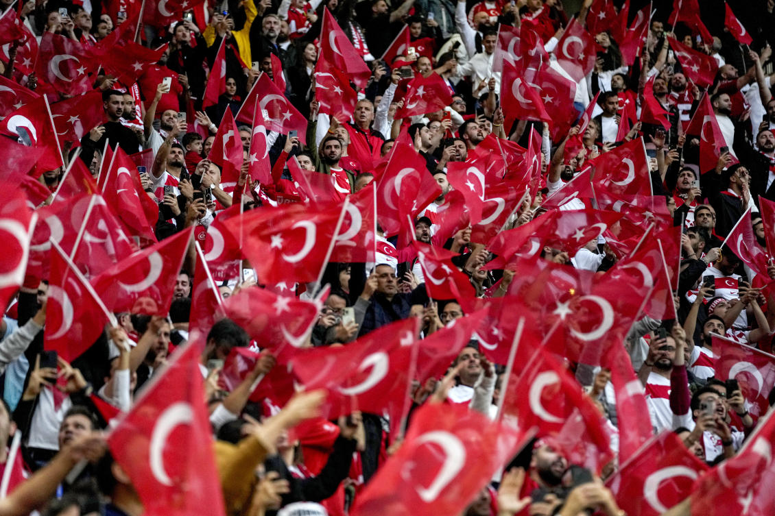Turkish fans celebrate prior to a round of sixteen match between Austria and Turkiye at the Euro 2024 in Leipzig, Germany, on Jul. 2, 2024. (AP)