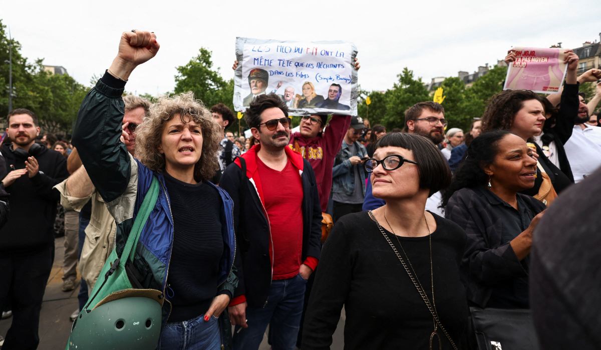 People gather to protest against the French far-right party in Paris. (Reuters)