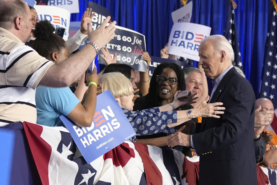 President Joe Biden, right, greets supporters at a campaign rally at Sherman Middle School in Madison, Wisconsin, Friday, July 5, 2024. (AP)