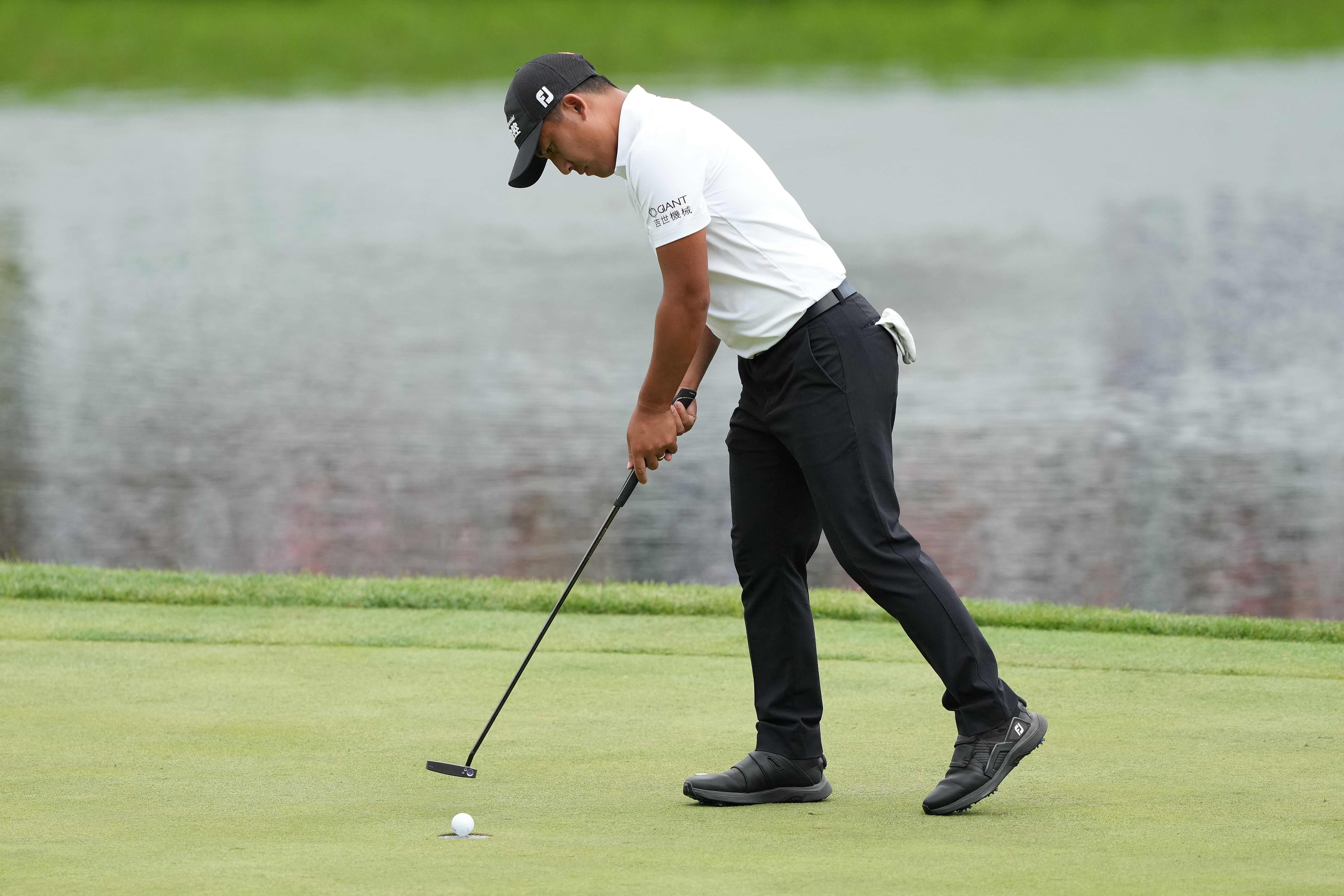 C.T. Pan of Taiwan putts for par on the 18th hole during the second round of the John Deere Classic at TPC Deere Run on July 5, 2024 in Silvis, Illinois. (GETTY IMAGES NORTH AMERICA /AFP)
