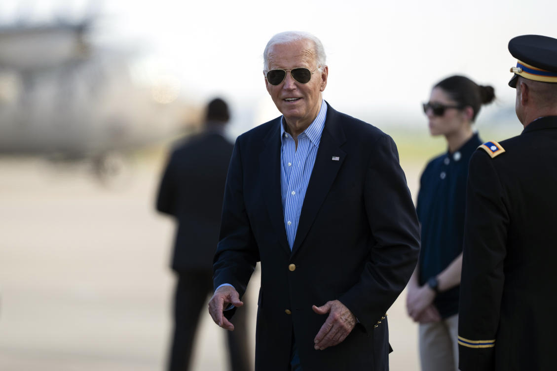 President Joe Biden responds to questions from the traveling press as he arrives at Delaware Air National Guard Base in New Castle, Del., from a campaign rally in Madison, Wis. (File/AP)