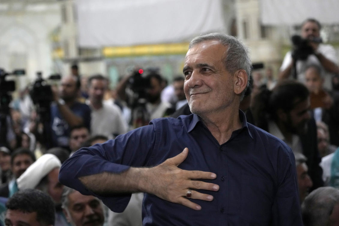 Iran’s President-elect Masoud Pezeshkian greets his supporters in a meeting a day after the presidential election, at the shrine of the late revolutionary founder Ayatollah Khomeini, just outside Tehran, on Jul. 6, 2024. (AP)