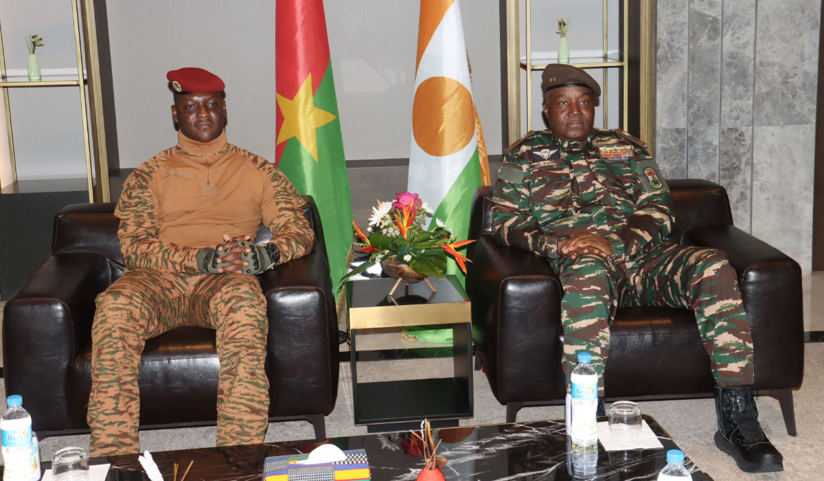 Burkina Faso's Captain Ibrahim Traore (L) sit next to Niger's General Abdourahamane Tiani (R) upon his arrival in Niamey on July 5, 2024. (AFP)
