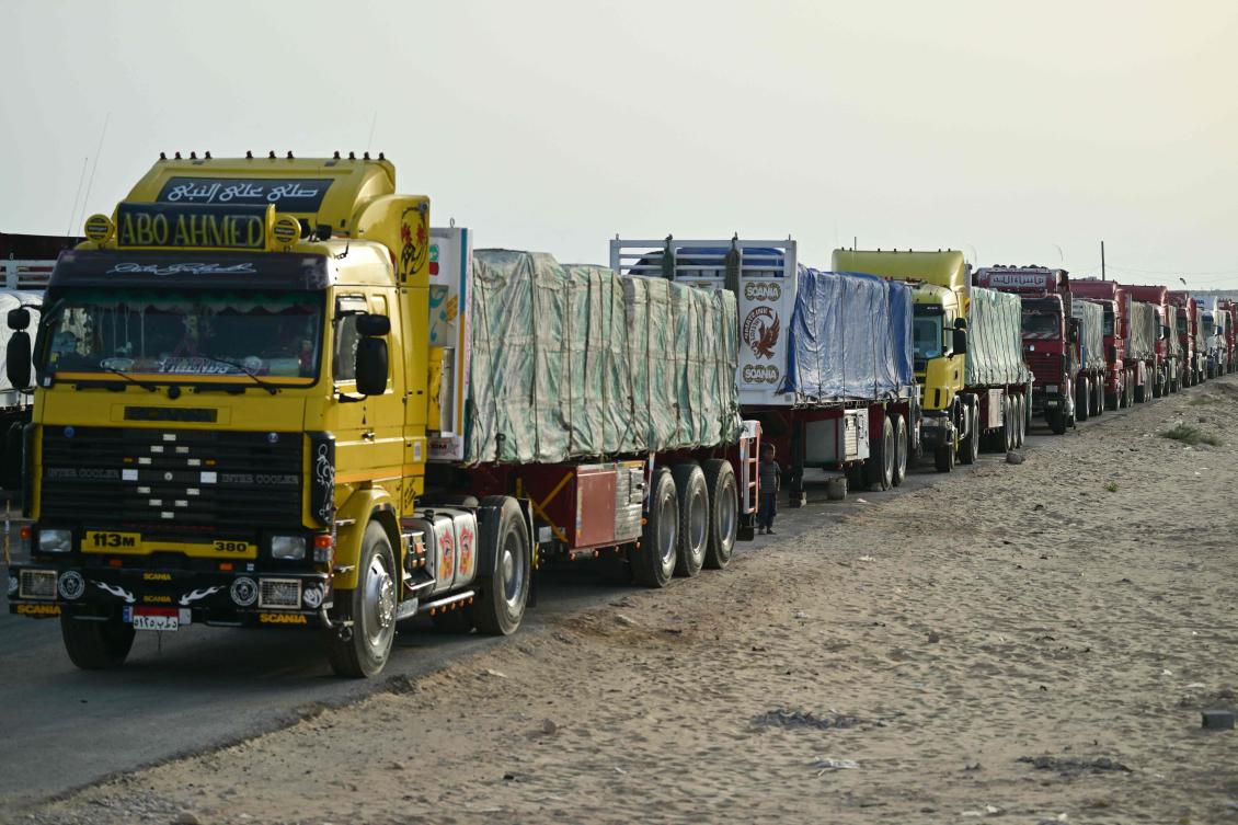 Hundreds of trucks loaded with food and water have been stranded, some for nearly two months, awaiting permission to deliver the much needed humanitarian supplies to war-torn Gaza. (AFP)