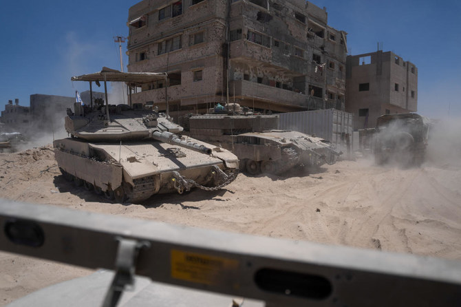 Gaza residents said tanks advanced from at least three directions and reached the heart of Gaza City, backed by heavy Israeli fire from the air and ground. (Reuters)