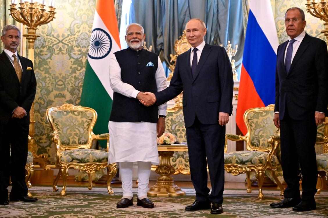 Russian President Vladimir Putin shakes hands with Indian Prime Minister Narendra Modi during a meeting at the Kremlin in Moscow on July 9, 2024. (AFP)