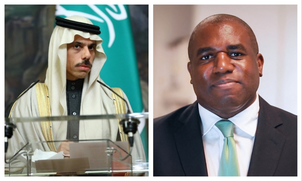 Saudi Foreign Minister Prince Faisal bin Farhan and British Secretary of State for Foreign, Commonwealth, and Development Affairs David Lammy. (File/AFP)