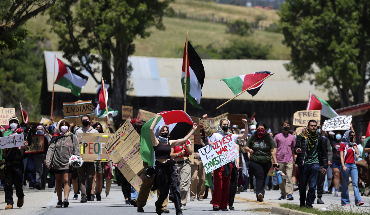 University of California, Santa Cruz graduate students and other academic workers in the UAW 4811 union begin a strike and are joined by UCSC students for Justice in Palestine as they picket the main entrance to campus on Monday, May 20, 2024, in Santa Cruz, Calif. (AFP file photo)