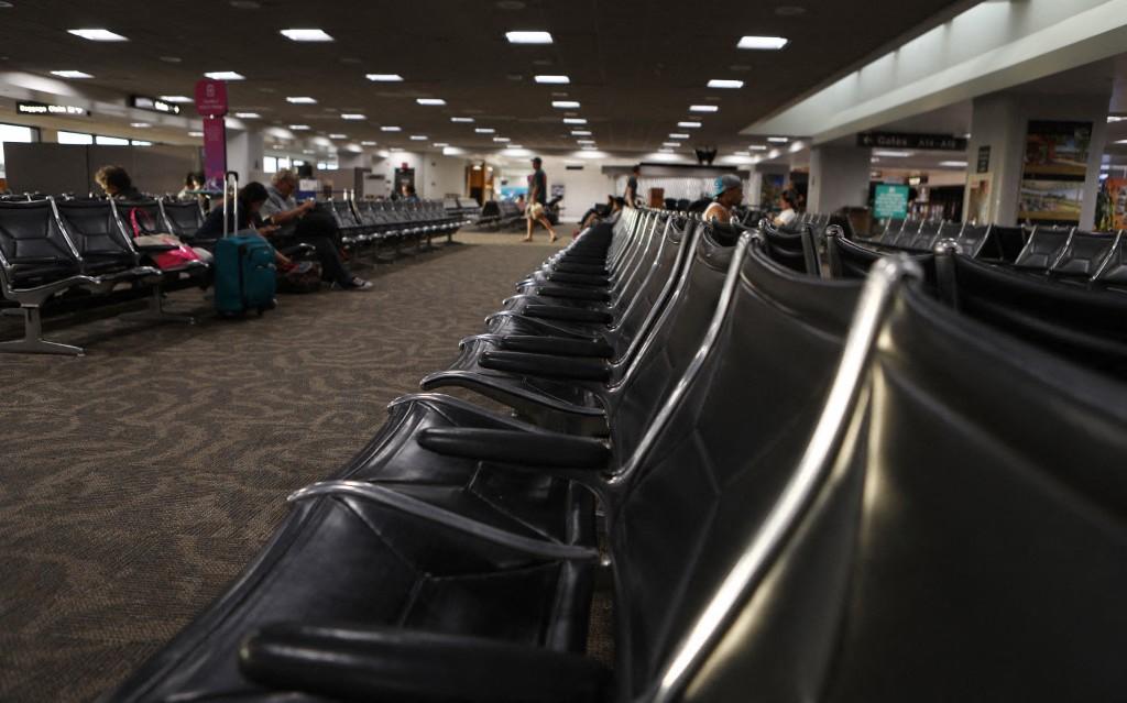 Hawaii airport evacuated over Japanese man’s grenades: police