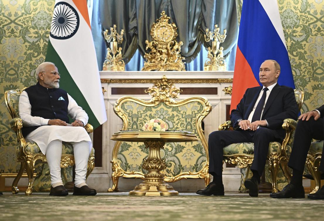 Indian Prime Minister Narendra Modi, left, and Russian President Vladimir Putin speak during a meeting at the Kremlin in Moscow, Russia, Tuesday, July 9, 2024. (AP)