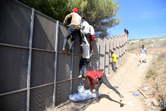 More than 40 people have been held in Italy over migrant visa fraud, police and prosecutors said on Wednesday, weeks after Prime Minister Giorgia Meloni complained that mafia groups were exploiting the system for profit. (AFP/File)