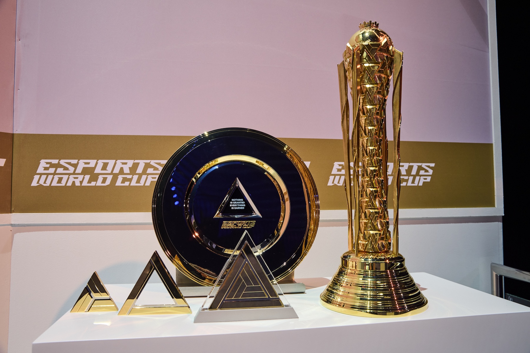 The first ever Esports World Cup trophy (right) was crafted by designers Thomas Lyte (Supplied)
