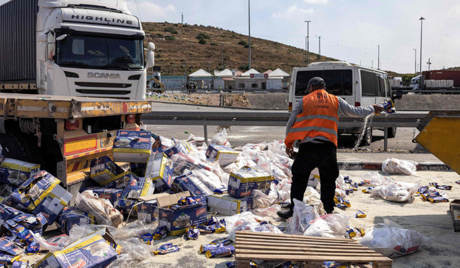A UK-based aid group said one of its employees in Gaza was killed Friday in an Israeli strike that hit its warehouse located inside an Israeli-declared humanitarian safe zone. (AFP)