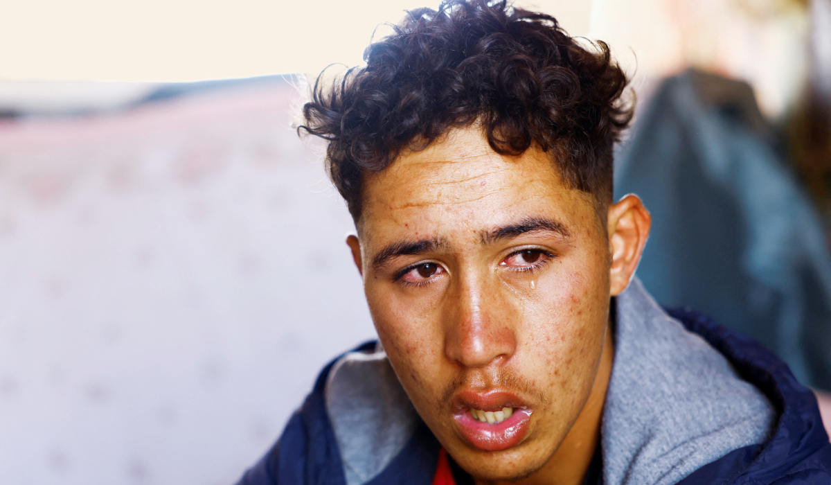 Abdellatif Bouhlal, 18 years old, Moroccan migrant cries when he remembers that he has not seen his mother for more than 3 years, on the island of Gran Canaria, Spain, July 11, 2024. (REUTERS)