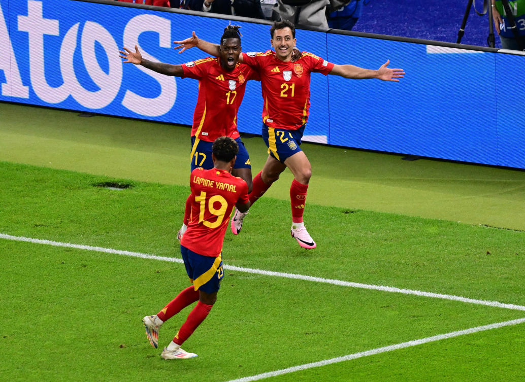 Spain’s Mikel Oyarzabal celebrates scoring their second goal with Nico Williams and Lamine Yamal. (Reuters)