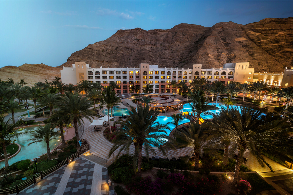 Shangri-La Al Waha hotel complex in Muscat, Oman, at dusk. Shutterstock