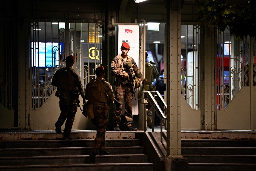 French soldier stands guard outside the Gare de l'Est train station. (AFP)