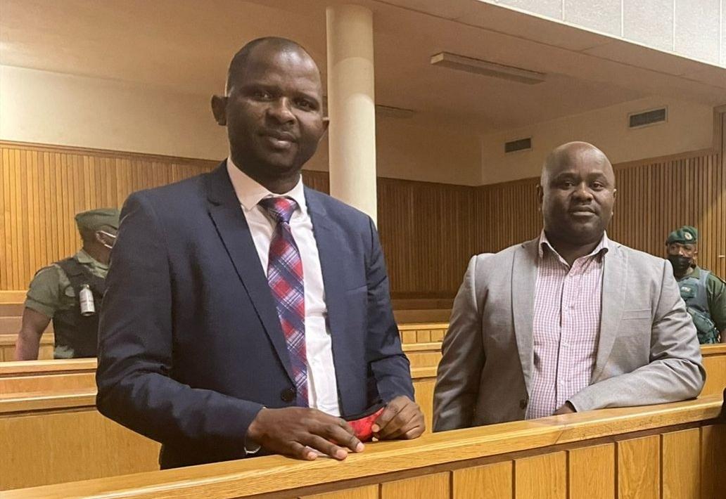 Former Eswatini members of parliament Mduduzi Bacede Mabuza (left) and Mthandeni Dube stand in court. (Supplied/Amnesty International)