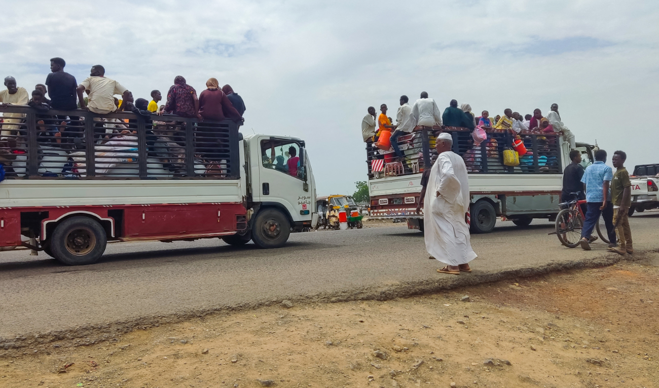 People fleeing the town of Singa, the capital of Sudan's southeastern Sennar state, arrive in Gedaref in the east of the war-torn country on July 1, 2024. (AFP/File)