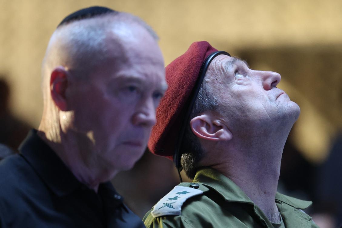 Israeli Defence Minister Yoav Gallant (L) and army Chief of Staff Herzi Halevi attend a commemoration ceremony for soldiers killed during the 2014 Gaza war, also known as Operation Protective Edge, at the Memorial Hall on Mount Herzl in Jerusalem on July 16, 2024. (AFP)