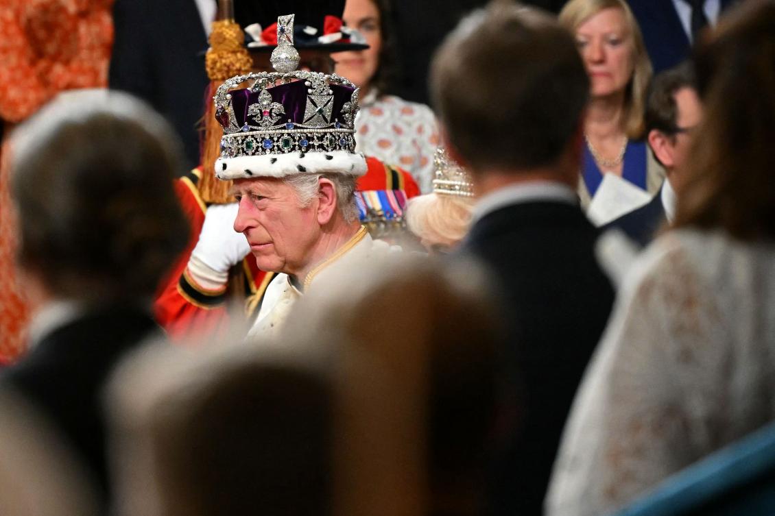 King Charles’ III speech at the State Opening of Parliament tried to set a new tone to British politics, promoting service rather than self-interest. (AFP)