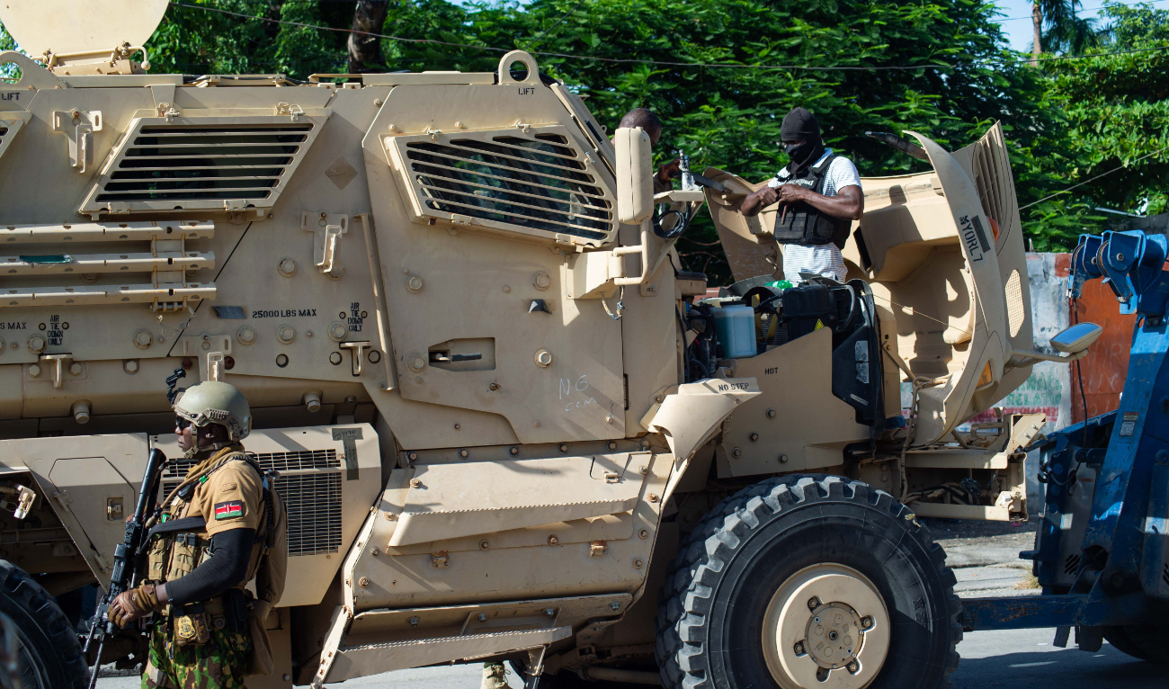 Kenyan police exit an armored vehicle during a deployment of Kenyan police officers near the national palace, in the city center of Port-au-Prince, Haiti, July 17, 2024. (AFP)