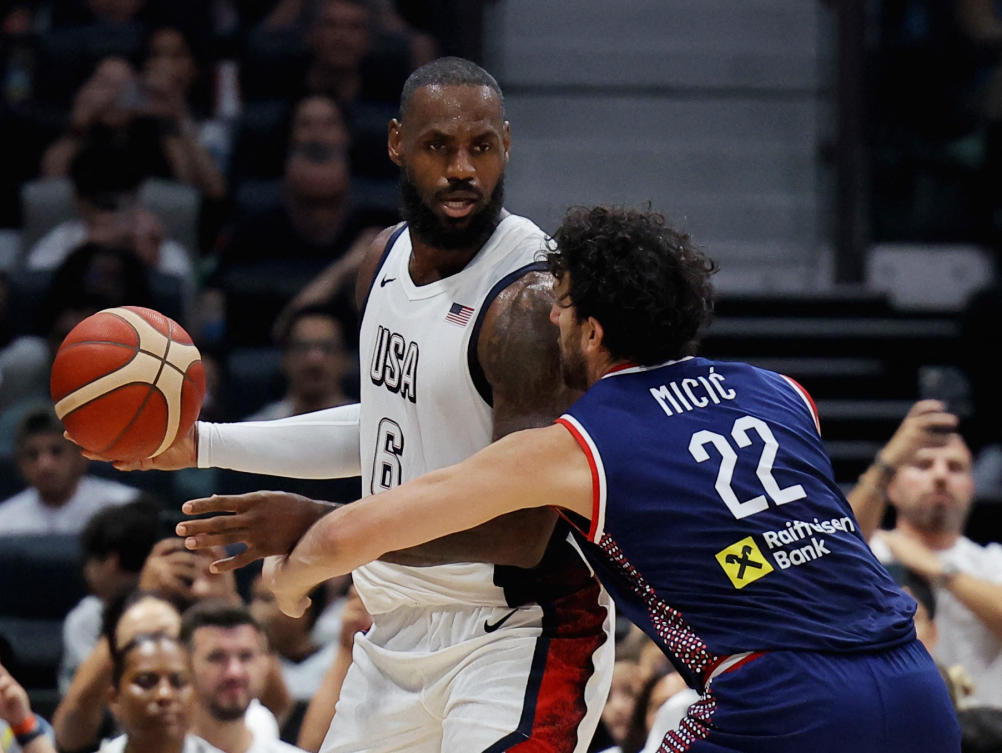 LeBron James of the US in a play against Serbia’s Vasilije Micic in Abu Dhabi. (Reuters)
