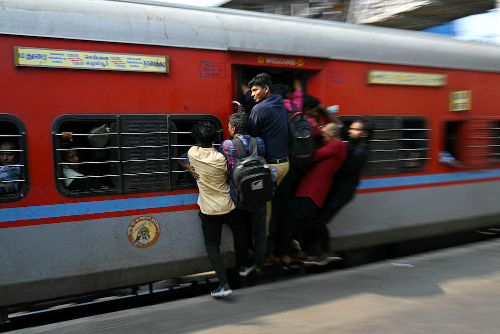 More than 12 million people ride 14,000 trains across India daily, traveling on 64,000 kilometers of track. (AFP file photo)