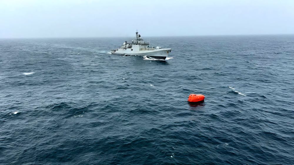 The INS Teg approaches a lifeboat in the Arabian Sea. (X/@indiannavy)