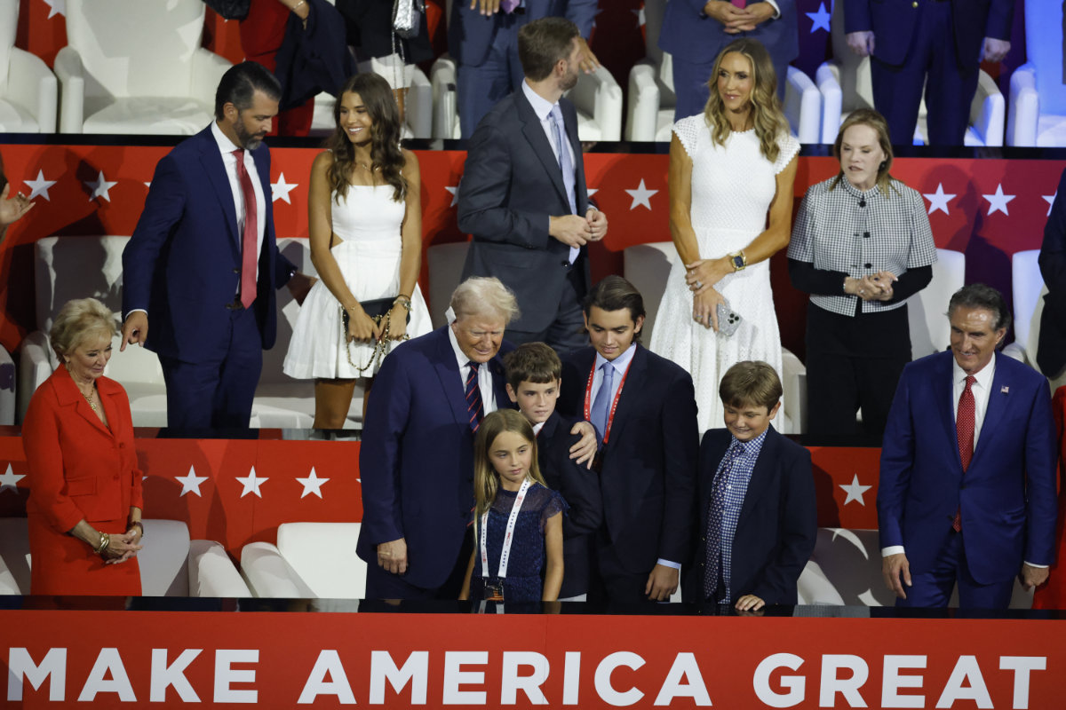 Republican presidential nominee and former US President Donald Trump stands with members of his extended family on Day 3 of the Republican National Convention, at the Fiserv Forum in Milwaukee, Wisconsin, on July 17, 2024. (REUTERS)
