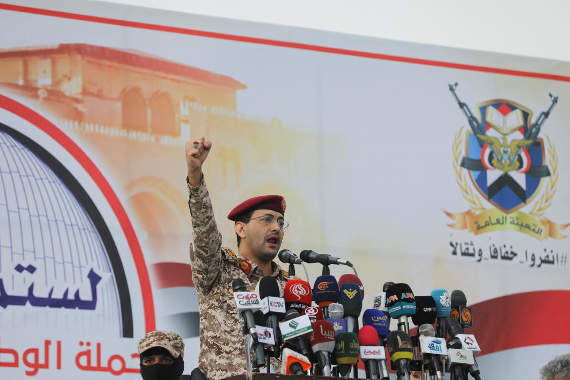 Houthi military spokesperson, Yahya Sarea, delivers a statement in which he claimed an attack on the Lobivia ship, during a pro-Palestinian rally in Sanaa, Yemen July 19, 2024. (Reuters)