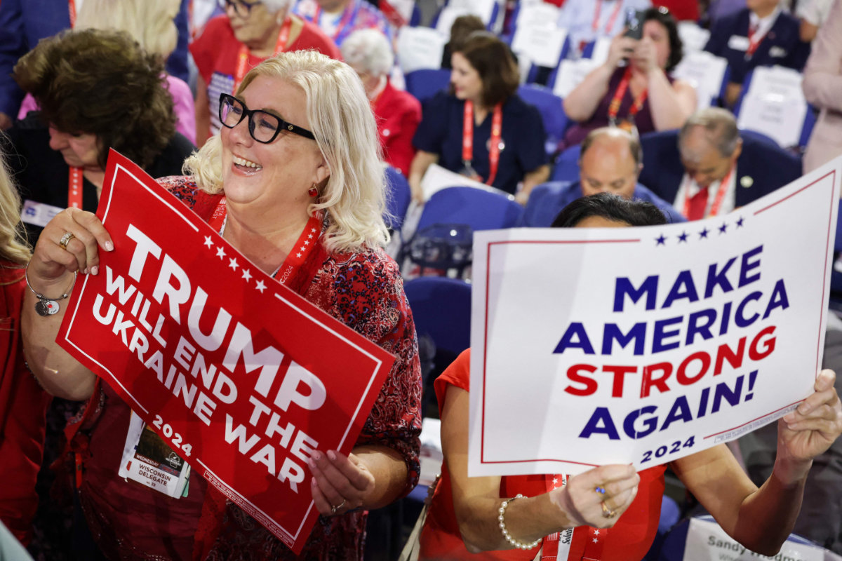 Donald Trump's supporters display signs that read "Trump Will End the Ukraine War" and "Make America Strong Again" on the third day of the Republican National Convention at the Fiserv Forum on July 17, 2024 in Milwaukee, Wisconsin. (Getty Images/AFP)