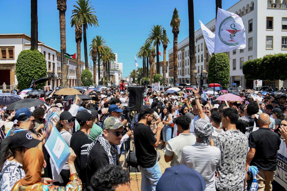 Moroccan medical students attend a rally against the government’s's decision to reduce the length of medicine studies from seven to six years, in Rabat. (File/AFP)