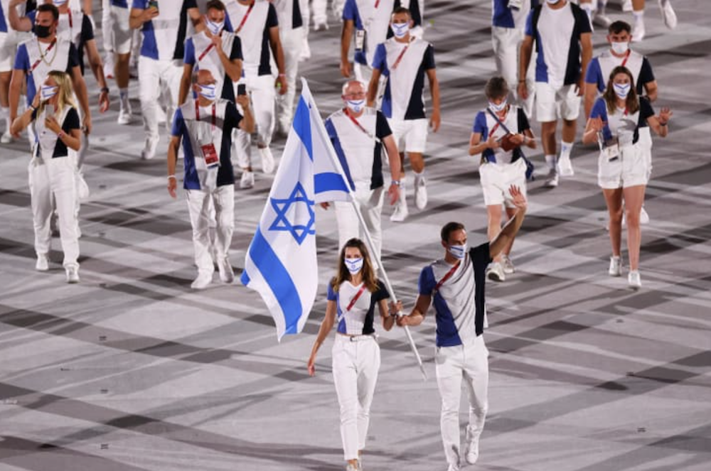 The Palestine Olympic Committee has urged Olympics authorities to ban Israeli athletes (seen here at the Tokyo Games opening ceremony) from taking part in the upcoming Paris Games. (Reuters/File Photo)