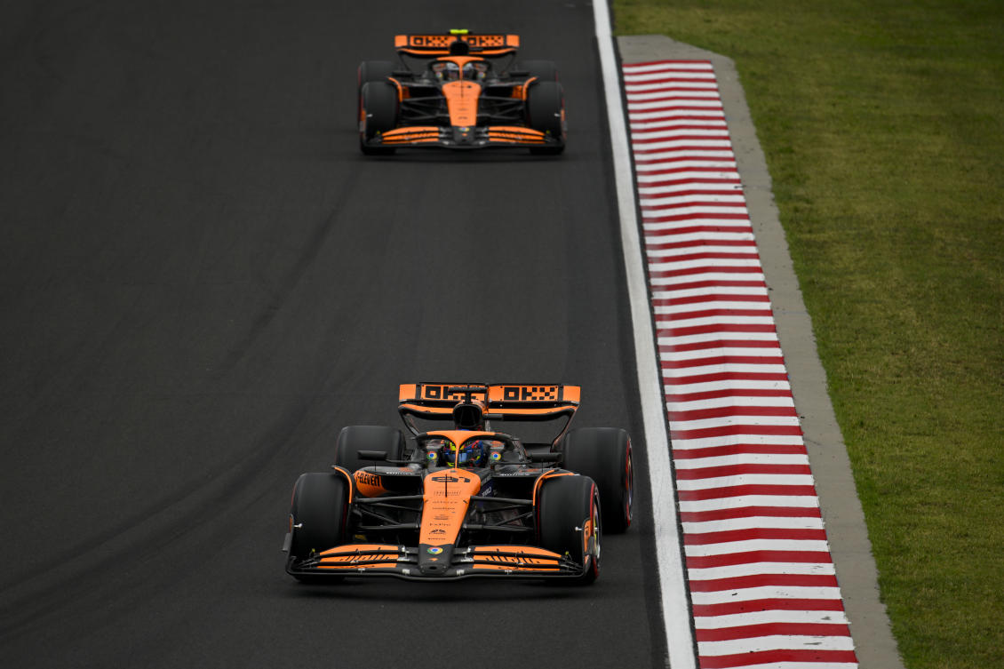 McLaren driver Oscar Piastri of Australia steers his car followed by McLaren driver Lando Norris of Britain during the qualifying ahead of Sunday’s Formula One Hungarian Grand Prix at the Hungaroring racetrack in Mogyorod, near Budapest. (AP)
