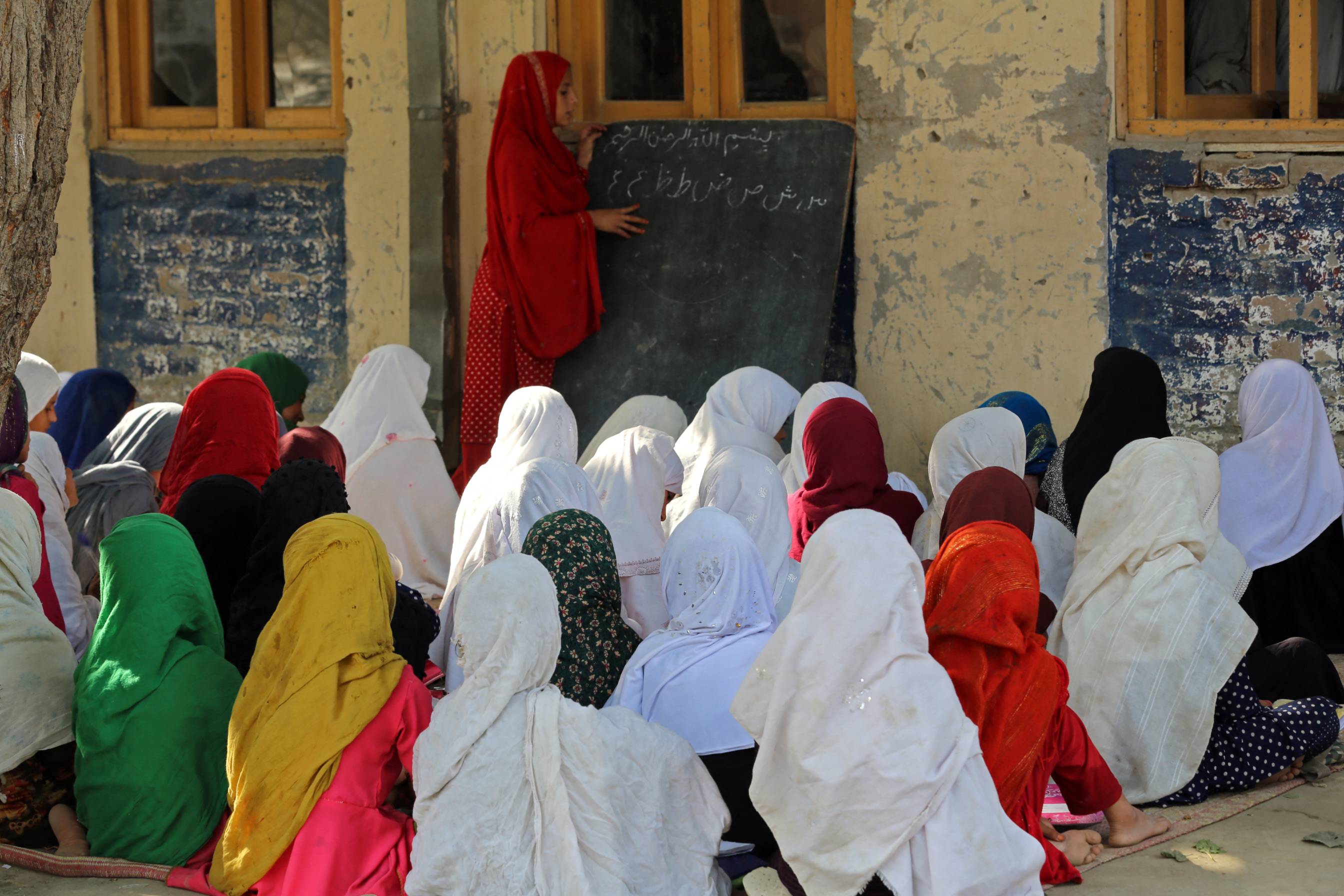 Afghan girls attend their class at a primary school in Bati Kot district of Nangarhar province on September 18, 2023. (File/AFP)