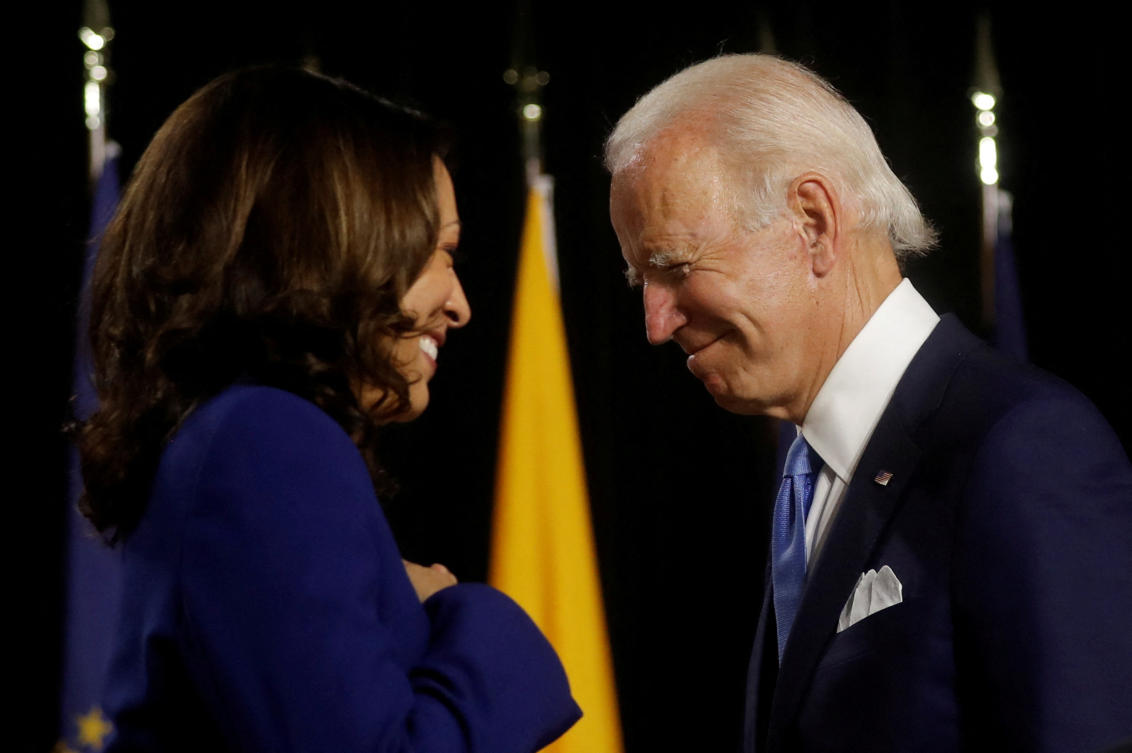 President Joe Biden (R) and vice president Kamala Harris (L) are seen at the stage during a campaign event. (Reuters/File Photo)