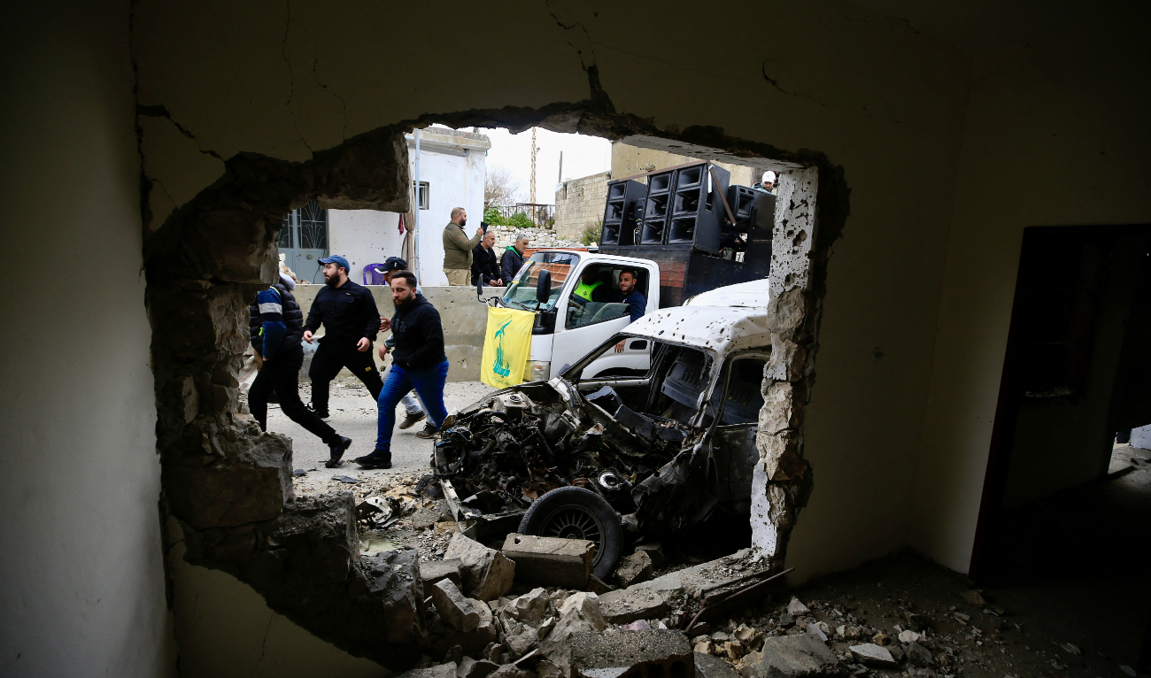 Hezbollah militants and supporters attend the funeral of one of the group’s members killed a day earlier in Israeli bombardment in the southern Lebanese village of Houla on March 6, 2024. (AFP/File)