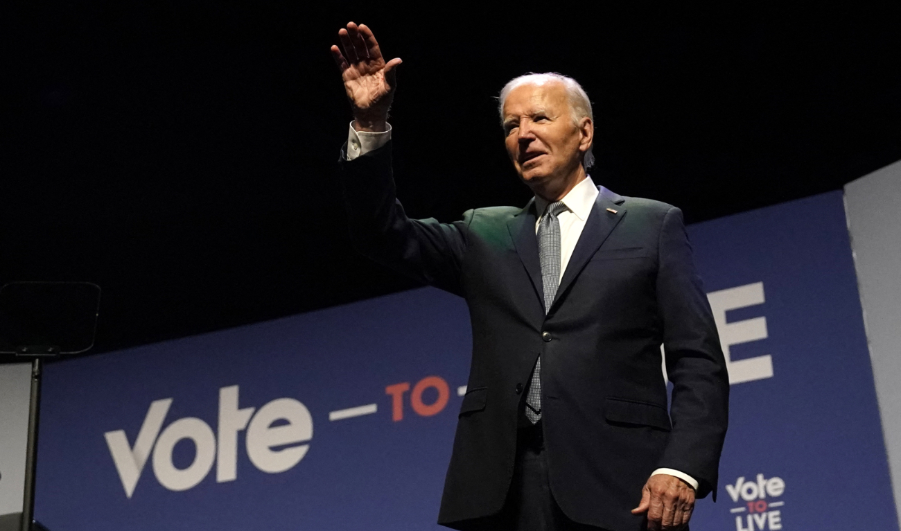 US President Joe Biden waves on stage during the Vote To Live Properity Summit at the College of Southern Nevada in Las Vegas, Nevada, on July 16, 2024. (AFP/File)