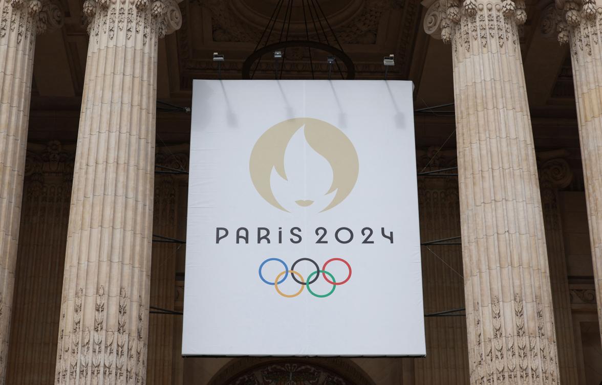 This photograph shows a logo of the Paris 2024 Olympic and Paralympic Games displayed on the Grand Palais Olympic site in Paris on July 22, 2024. (AFP)