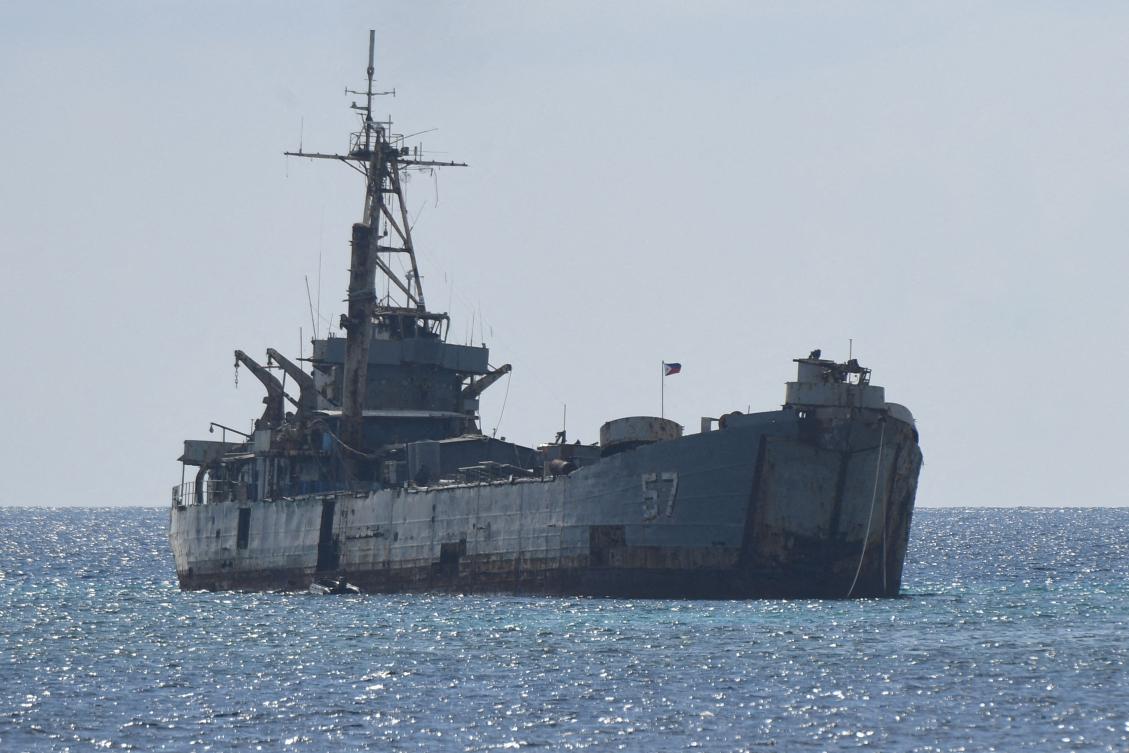 Chinese forces have had dangerous encounters with Filipino counterparts over resupply missions for navy personnel at Manila’s outpost at the Second Thomas Shoal, on a long-grounded and rusting warship, the BRP Sierra Madre, above. (AFP)