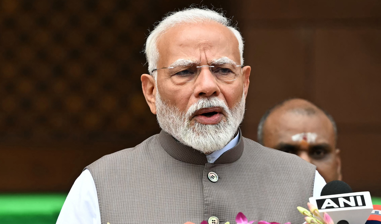 India’s Prime Minister Narendra Modi addresses upon his arrival to attend the monsoon session of the parliament in New Delhi on July 22, 2024. (AFP)
