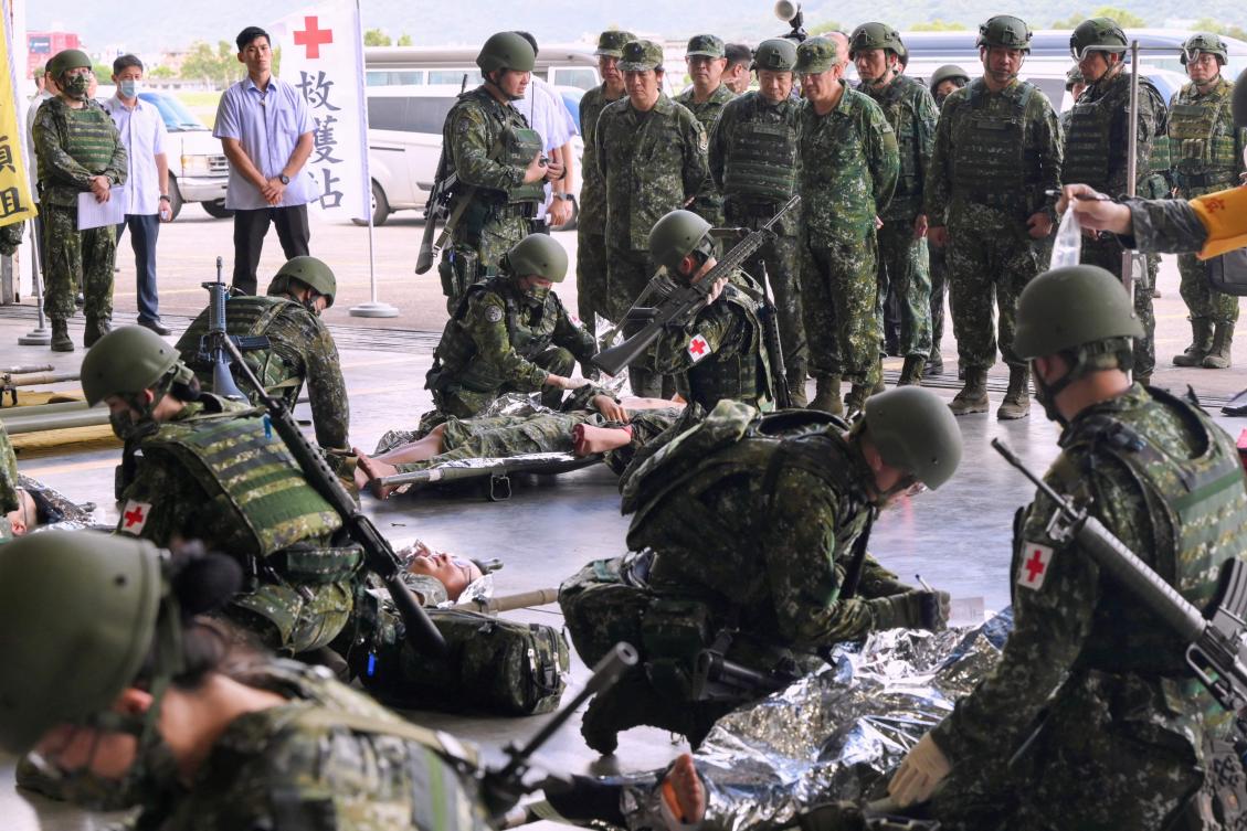 Taiwan President Lai Ching-te, center, watches a simulated mass casualty rescue exercise at an airforce base in Hualien on July 23, 2024. (AFP)