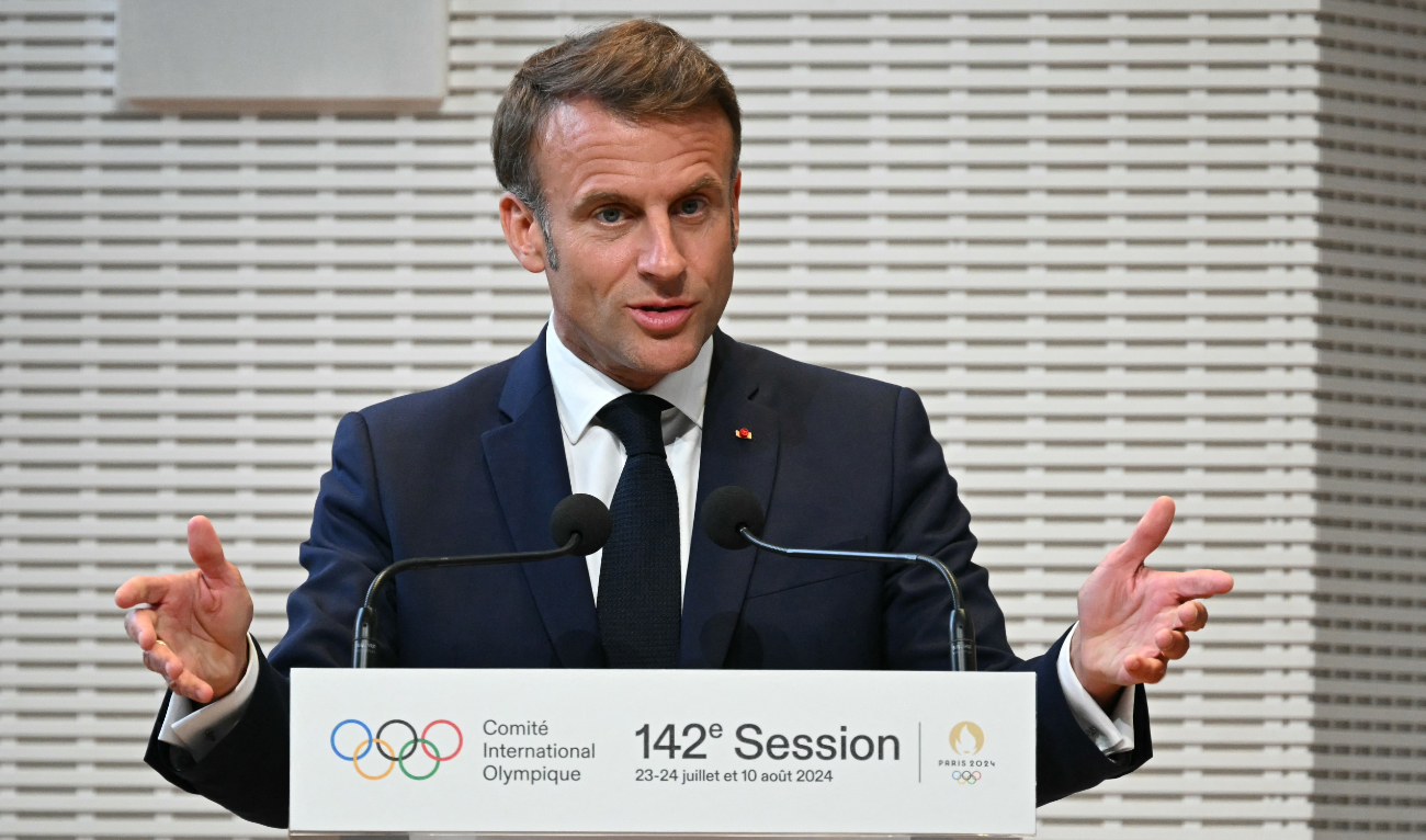 French President Emmanuel Macron delivers a speech during the opening ceremony of the 142nd IOC Session, four days ahead of the opening ceremony of the Paris 2024 Olympics, at the Louis-Vuitton foundation in Paris on July 22, 2024. (AFP)