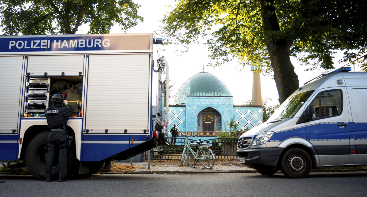 Police officers stage outside the Islamic Center Hamburg with the Imam Ali Mosque during a raid Wednesday, July 24, 2024, Hamburg, Germany. (AP)