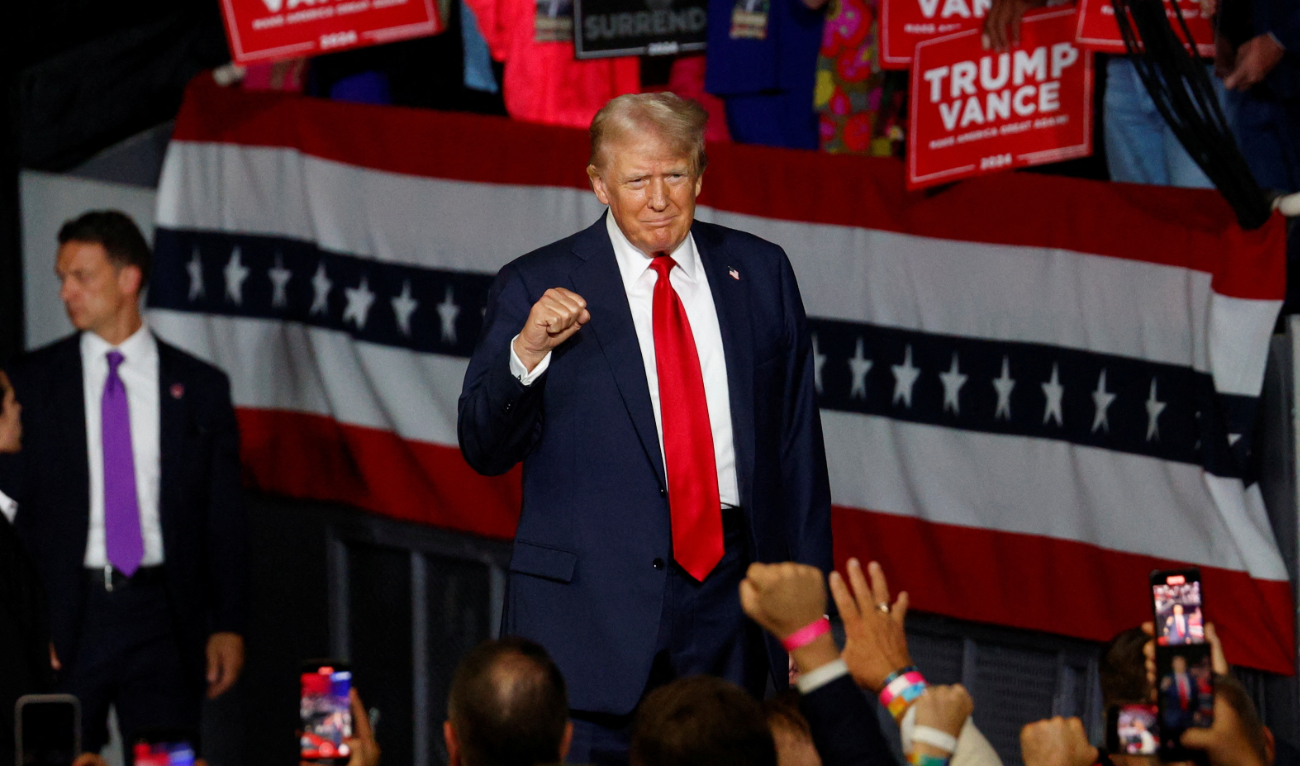 Republican presidential nominee and former US President Donald Trump gestures as he takes the stage during a campaign event in Charlotte, North Carolina, US, July 24, 2024. (Reuters)