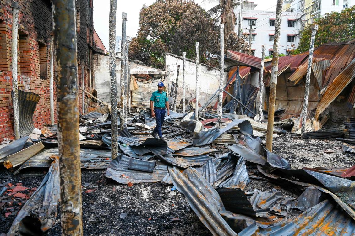 Above, the charred remains of state broadcaster Bangladesh Television in Dhaka on July 24, 2024 after students set it on fire during the anti-quota protest. (AFP)