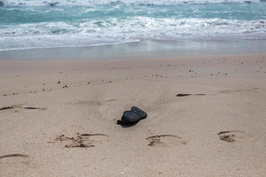 File photo used for administrative purposes, a shoe belonging to a migrant who perished in a shipwreck off the coast of Mauritania is left on a beach outside Nouakchott on July 24, 2024. (AFP)